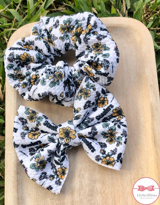 STEAL ERS FLORAL SCRUNCHIE OR BOW